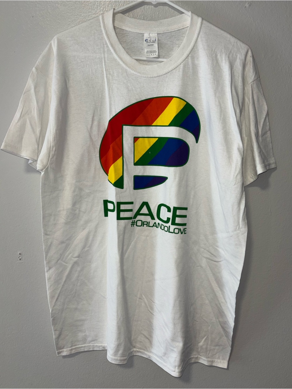 Peace OrlandoLove White Graphic T-Shirt with Rainbow Logo